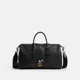 Bolsa Compass 35 de Disney x Coach con Mickey Mouse