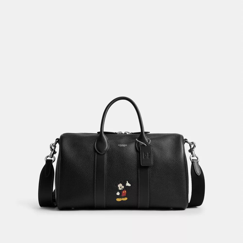 Bolsa Compass 35 de Disney x Coach con Mickey Mouse