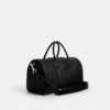 Bolsa Compass 35 de Disney x Coach con Mickey Mouse