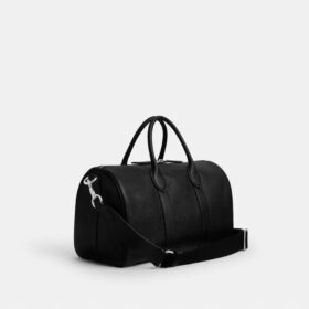 Bolsa Compass 35 de Disney x Coach con Mickey Mouse