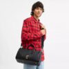 Bolsa Compass 35 de Disney x Coach con Mickey Mouse