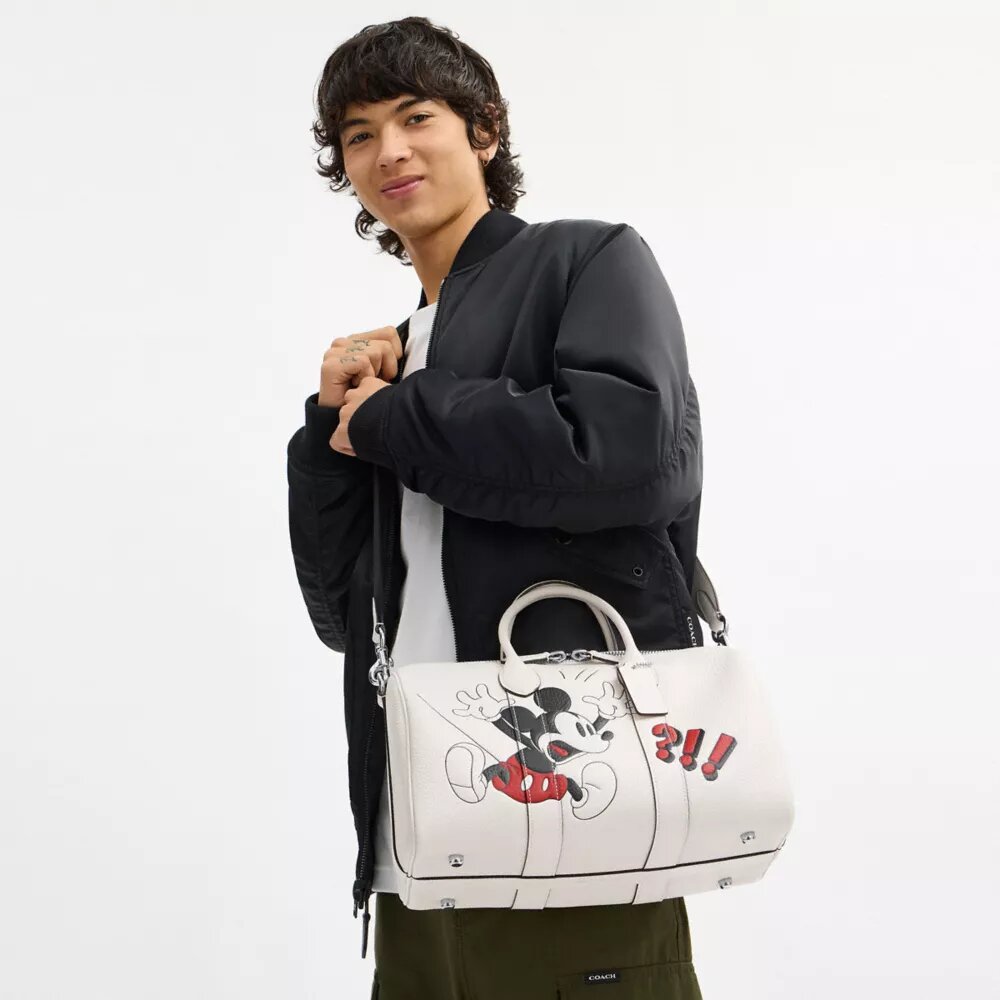 Bolsa Compass 35 de Disney x Coach con Mickey Mouse