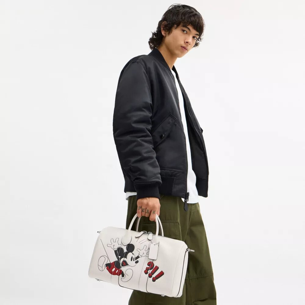 Bolsa Compass 35 de Disney x Coach con Mickey Mouse