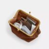 Bolsa con marco Kisslock 27