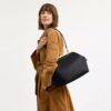 Bolsa con marco Kisslock 27