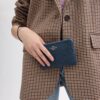 Bolsa de pulsera con cremallera en esquina en jacquard Signature