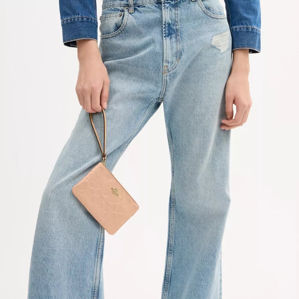 Bolsa de pulsera con cremallera en las esquinas en cuero exclusivo