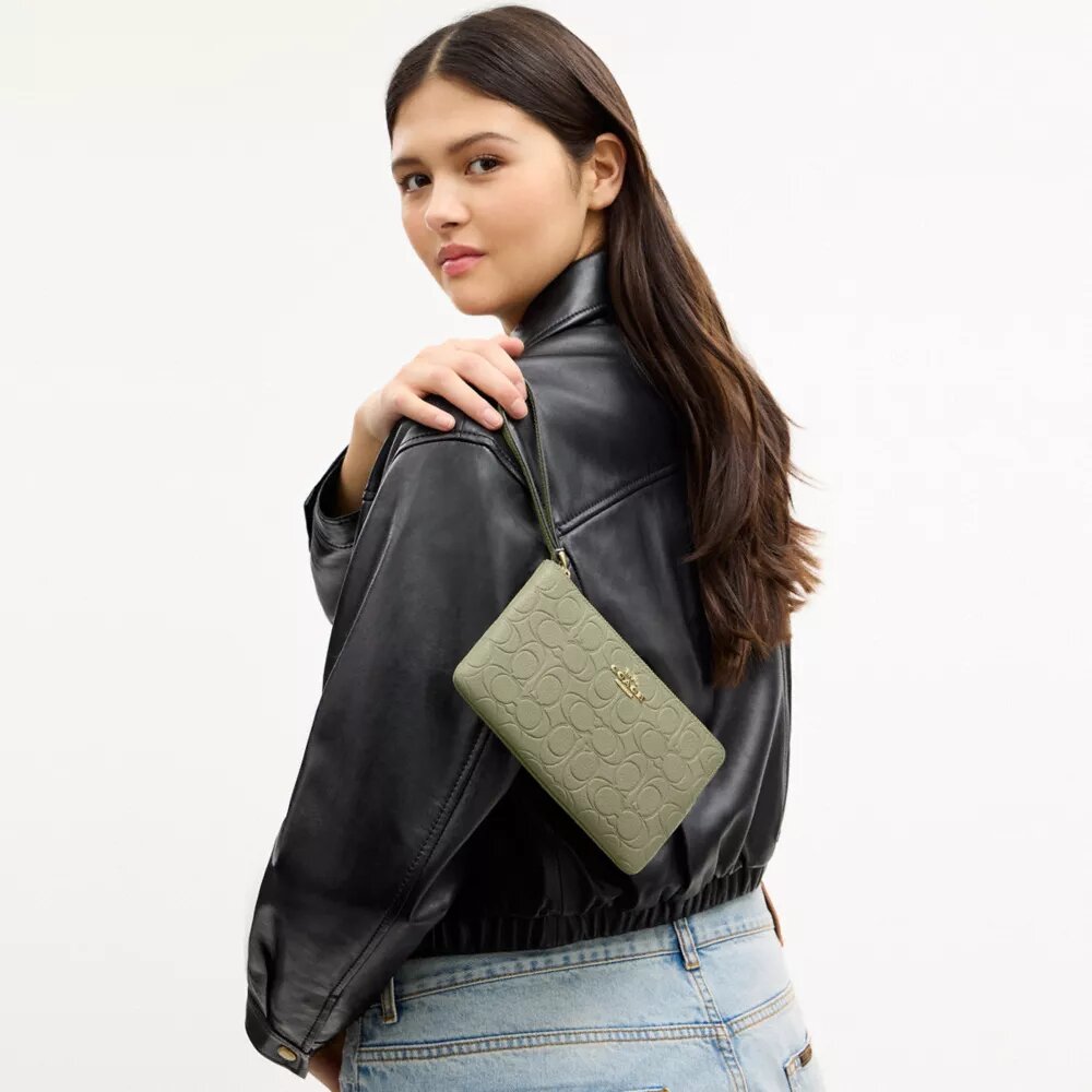 Bolsa de pulsera grande con cremallera en la esquina, en cuero exclusivo