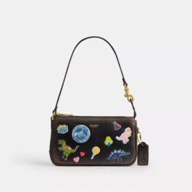 Bolsa «Plaza» de Rexy por su décimo cumpleaños, de 18 in de cuero desgastado con estampado de calcomanías