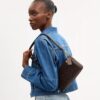 Bolso bandolera Audrey en Signature Canvas