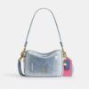 Bolso bandolera Carey en denim desgastado con Charms
