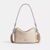 Bolso bandolera Carey en Signature Canvas