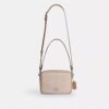 Bolso bandolera Carey en Signature Canvas