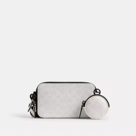 Bolso bandolera Charter Slim en Signature Canvas