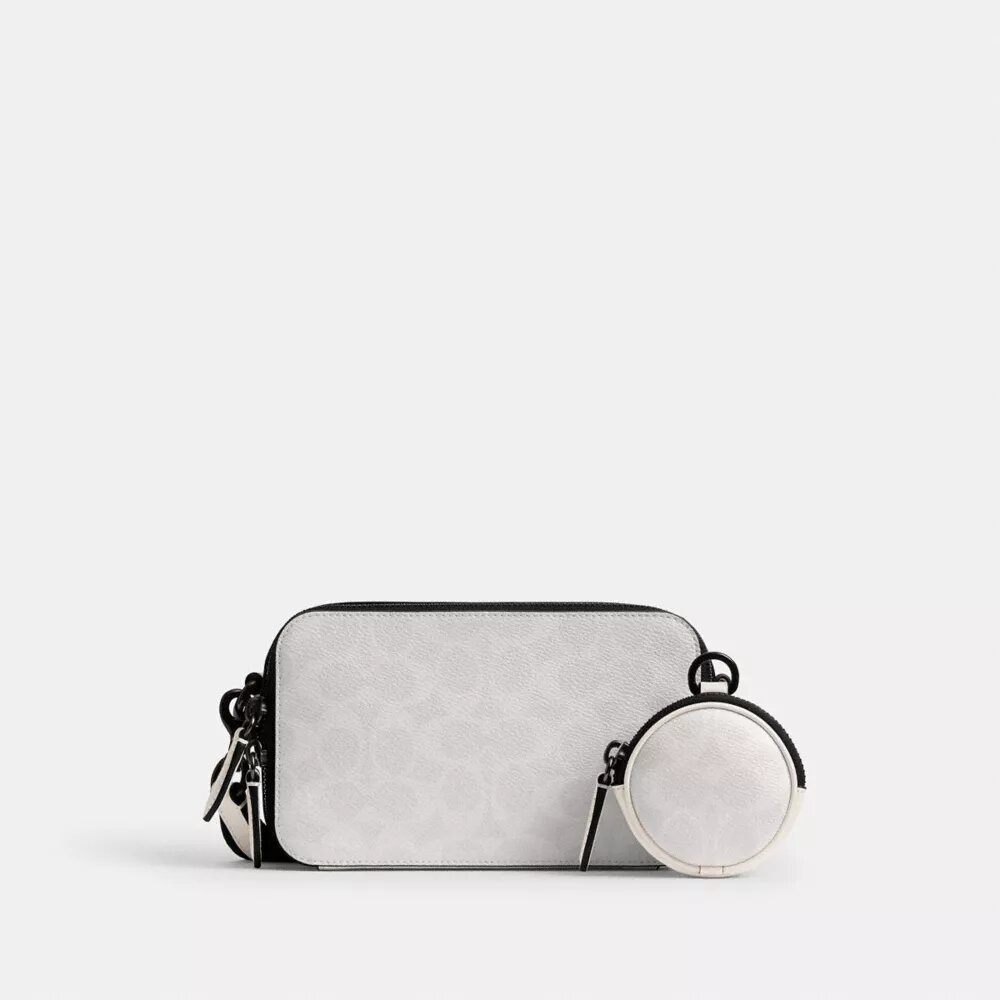 Bolso bandolera Charter Slim en Signature Canvas