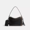 Bolso bandolera Dakota en cuero desgastado con Charms