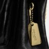 Bolso bandolera Elodie 18 en Signature Canvas
