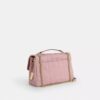 Bolso bandolera Elodie en denim desgastado con acolchado