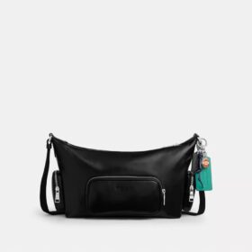Bolso bandolera Finn con bolsillos y dijes