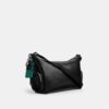 Bolso bandolera Finn con bolsillos y dijes