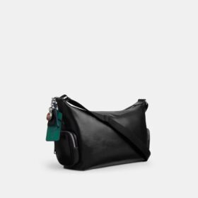 Bolso bandolera Finn con bolsillos y dijes