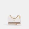 Bolso bandolera Klare en Signature Canvas