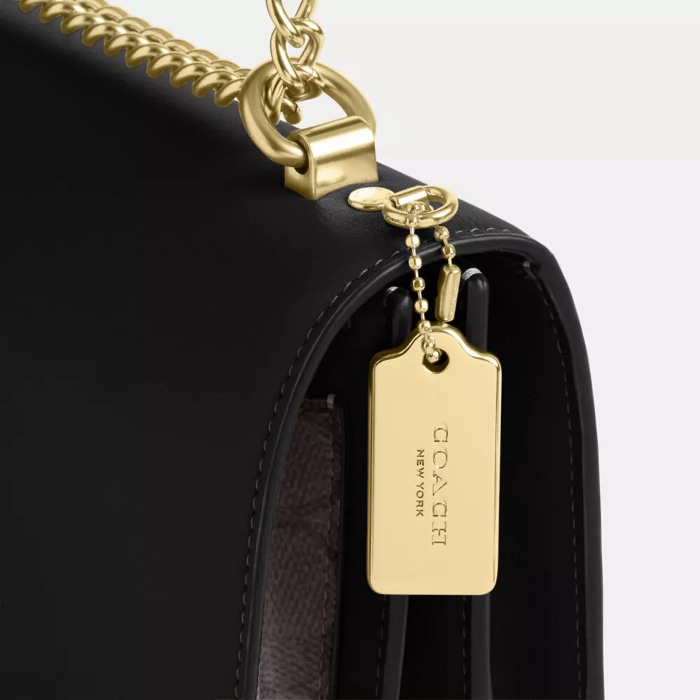 Bolso bandolera Klare en Signature Canvas