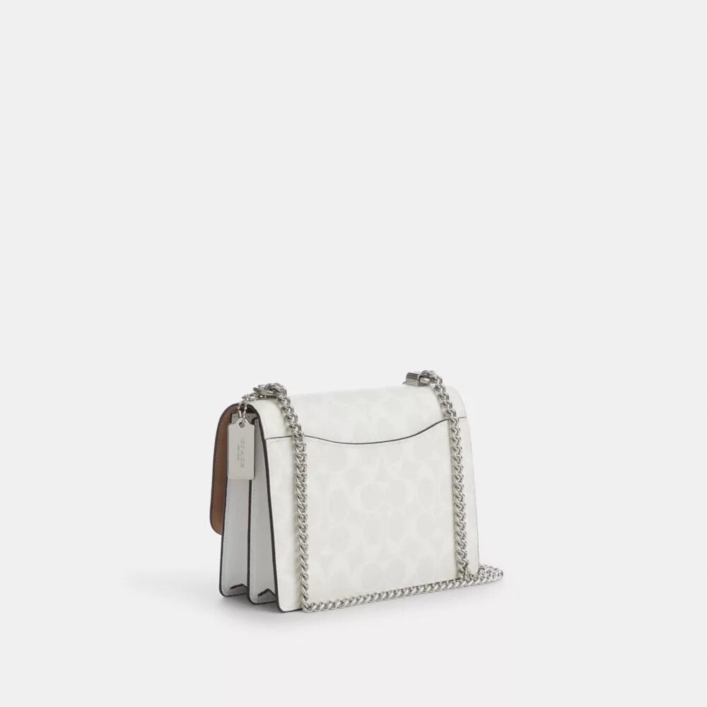 Bolso bandolera Klare en Signature Canvas
