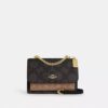 Bolso bandolera Klare en Signature Canvas con diseño en bloques