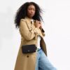 Bolso bandolera Mila con Signature Canvas