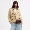 Bolso bandolera Mila con Signature Canvas