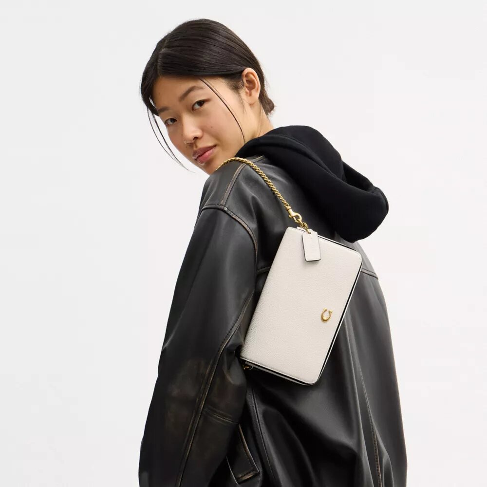 Bolso bandolera Mila con Signature Canvas