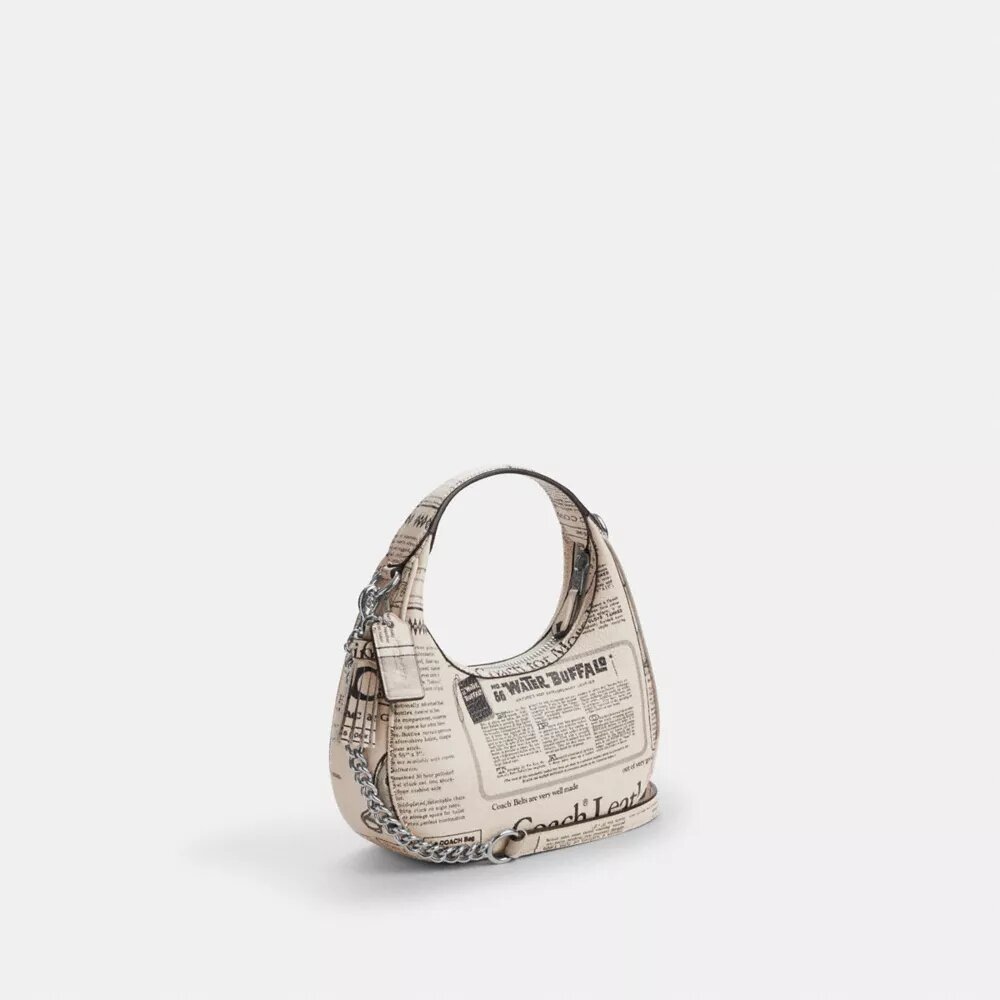 Bolso bandolera mini Carmen con estampado de periódico