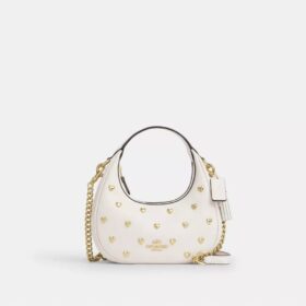 Bolso bandolera mini Carmen con remaches en forma de corazón