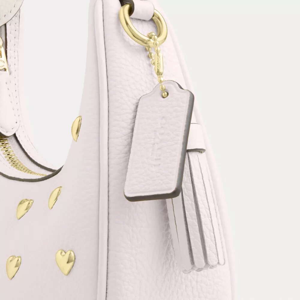 Bolso bandolera mini Carmen con remaches en forma de corazón