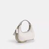 Bolso bandolera mini Carmen con remaches en forma de corazón