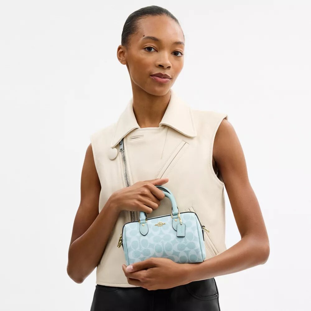 Bolso bandolera Mini Rowan en Signature Canvas