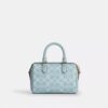 Bolso bandolera Mini Rowan en Signature Canvas