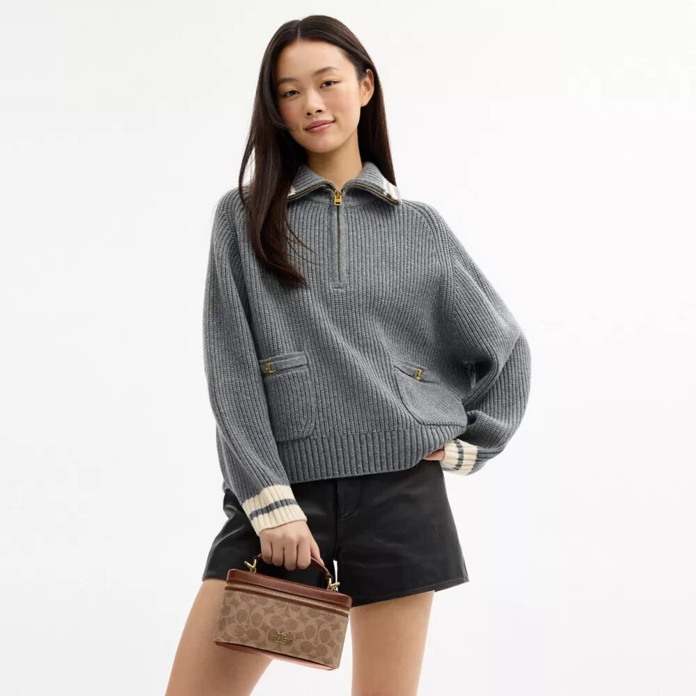 Bolso bandolera Rainer 18 en Signature Canvas
