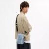 Bolso bandolera Tristan 14 en denim exclusivo Loved con Charms