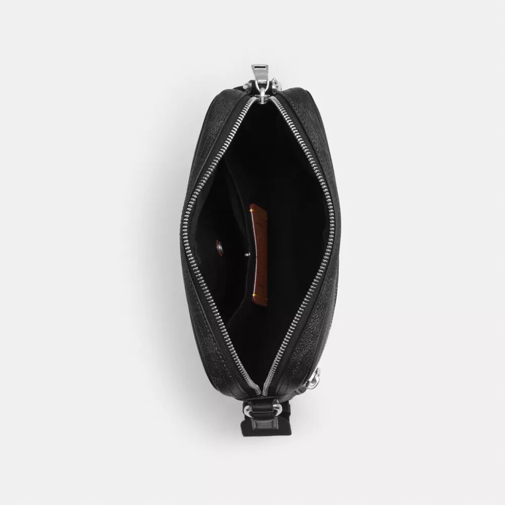 Bolso bandolera Tristan 22 en Signature Canvas