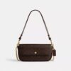 Bolso Brook con solapa y cadena en Signature Canvas