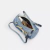 Bolso cilíndrico con cierre Kisslock de 28 en denim reciclado