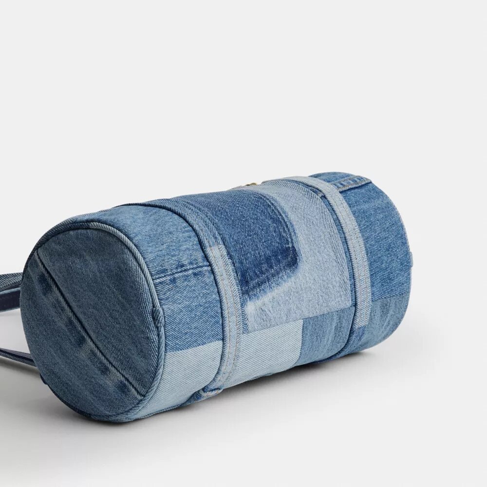Bolso cilíndrico con cierre Kisslock de 28 en denim reciclado