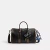 Bolso Compass 35 en cuero desgastado con Charms