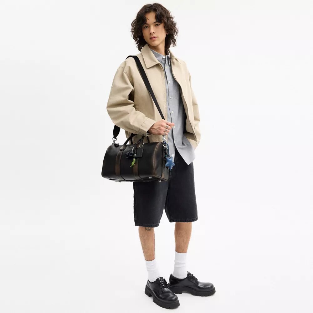 Bolso Compass 35 en cuero desgastado con Charms
