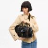 Bolso Compass 35 en cuero desgastado con Charms