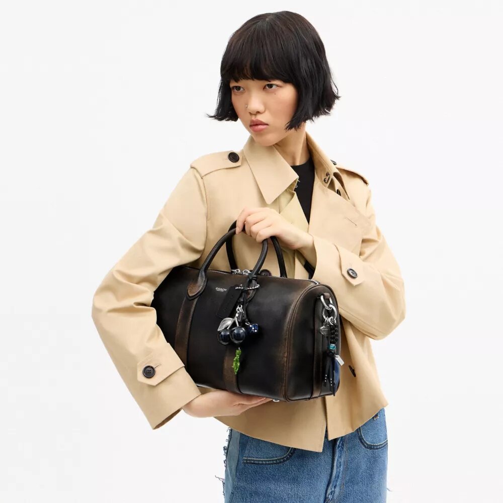 Bolso Compass 35 en cuero desgastado con Charms