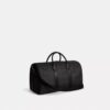 Bolso Compass 50 en Signature Canvas