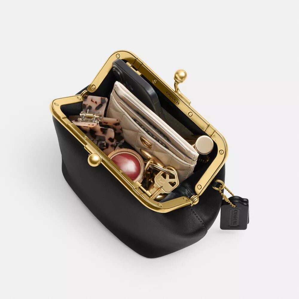 Bolso con marco Kisslock 16